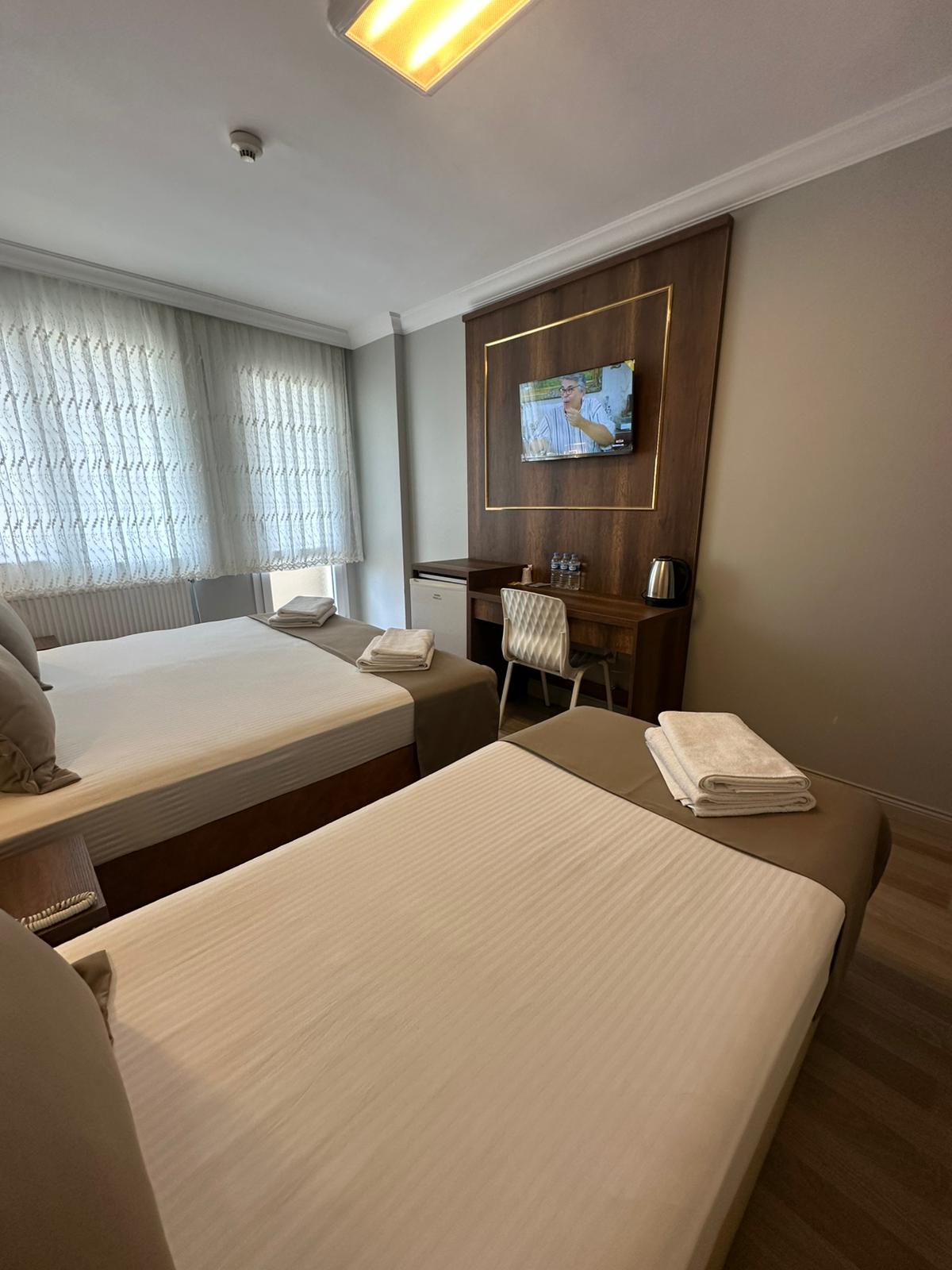 ÜÇ KİŞİLİK COMFORT DOUBLE + TEK YATAKLI BALKONLU ODA